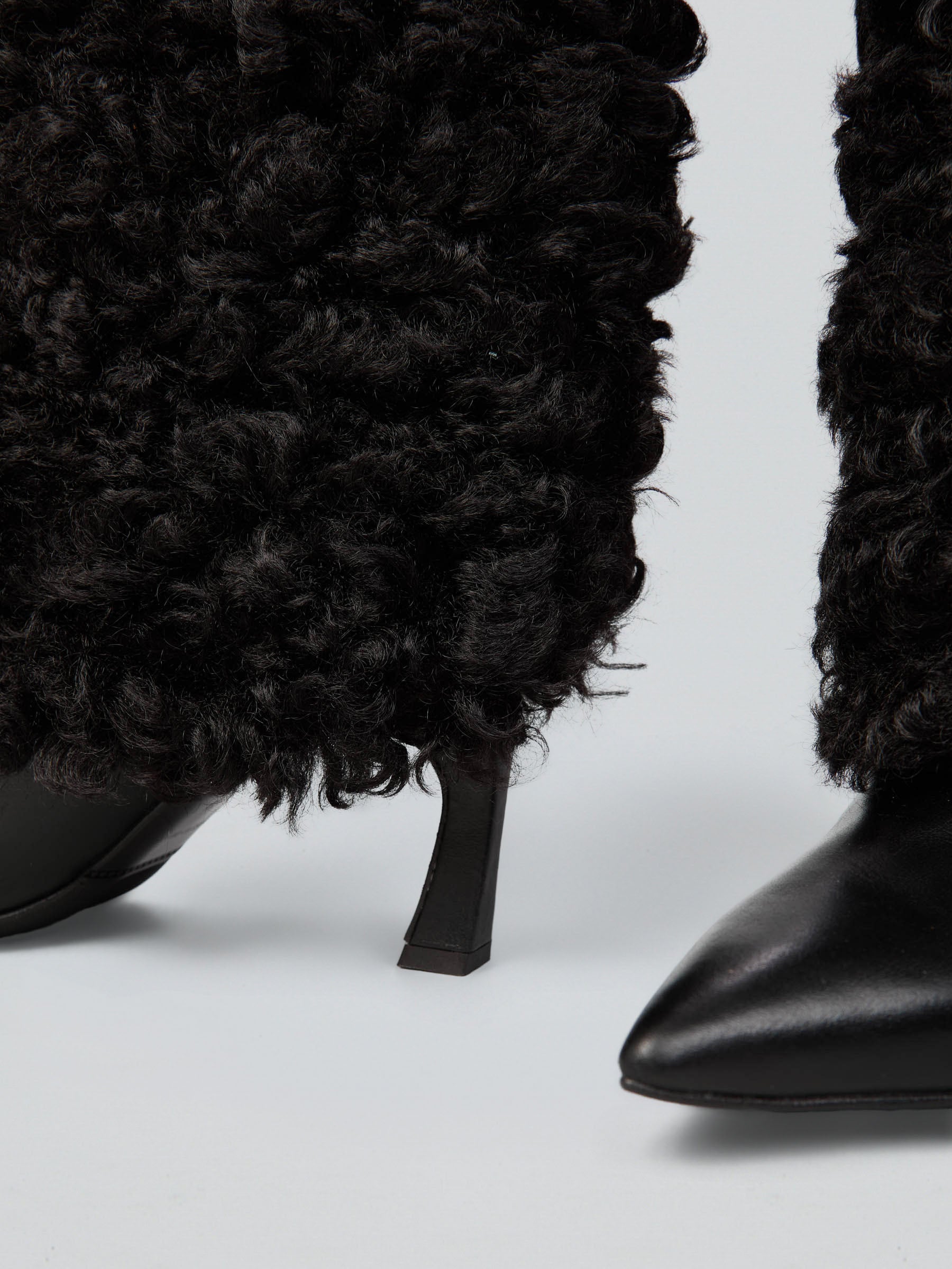 Ovyè Stivali con tacco pelle ecopelliccia nero 9 cm 38